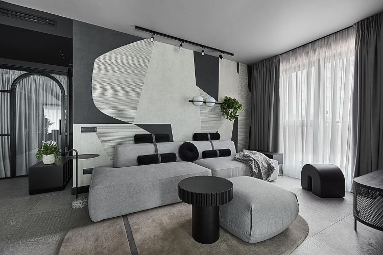  Moderan stan u minimalističkom stilu sa crnim zidovima i belim nameštajem